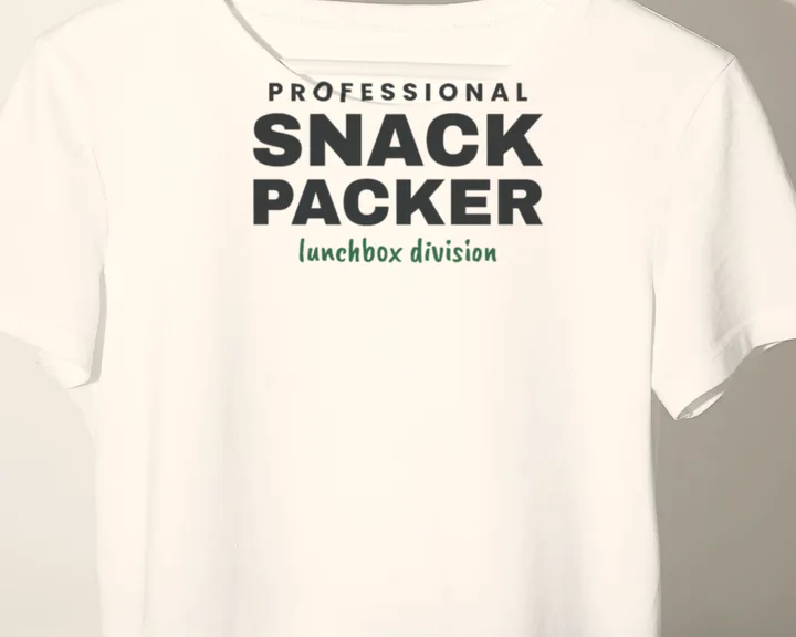 White "Professional Snack Packer" tee on a hanger against a white wall